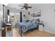 Inviting bedroom with beach themed accents, ceiling fan, and natural light from the window at 4470 Little River Inn Ln. # 1005, Little River, SC 29566