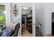 Walk-in closet with shelving for storage, hanging space, and natural light from a nearby window at 4470 Little River Inn Ln. # 1005, Little River, SC 29566