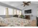 Spacious main bedroom featuring vaulted ceiling, a ceiling fan, and a comfortable seating area at 4470 Little River Inn Ln. # 1005, Little River, SC 29566