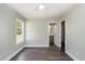 Cozy bedroom with gray floors and an en-suite bathroom at 469 Overcrest St., Myrtle Beach, SC 29579
