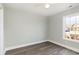 Bright bedroom with modern gray floors and a large window at 469 Overcrest St., Myrtle Beach, SC 29579