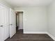 This hall features light green walls, light gray floors, and bright white trim at 469 Overcrest St., Myrtle Beach, SC 29579