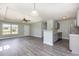 Open floor plan with modern kitchen featuring gray cabinets and a cozy living area at 469 Overcrest St., Myrtle Beach, SC 29579