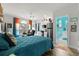 Bright studio bedroom features modern appliances, hardwood floors, a seating area, and an ensuite bathroom at 4749 Wild Iris Dr. # 205, Myrtle Beach, SC 29577