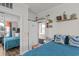 Inviting bedroom featuring mirrored closet, view to front door and comfortable decor at 4749 Wild Iris Dr. # 205, Myrtle Beach, SC 29577