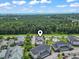 Scenic aerial view of the community, showcasing the lush greenery, pool, and proximity to the beach at 4803 Bovardia Pl. # 104, Myrtle Beach, SC 29577