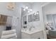Featuring a well-lit vanity and a view into the bedroom, this bathroom offers a bright and open feel at 4803 Bovardia Pl. # 104, Myrtle Beach, SC 29577