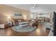 Inviting living room featuring hardwood floors, coordinated furniture, and open-concept design at 4803 Bovardia Pl. # 104, Myrtle Beach, SC 29577
