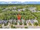 Wide aerial view of residential area, showcasing a community nestled among lush greenery and trees at 4814 Greenhaven Dr., North Myrtle Beach, SC 29582