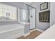 Bathroom featuring a tub next to a glass door shower at 4814 Greenhaven Dr., North Myrtle Beach, SC 29582
