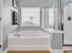 Bathroom featuring a tub next to a glass door shower at 4814 Greenhaven Dr., North Myrtle Beach, SC 29582