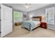 Cozy bedroom filled with natural light, featuring neutral decor and comfortable bed at 4814 Greenhaven Dr., North Myrtle Beach, SC 29582