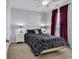 Bedroom featuring a bed, nightstands, and dark curtains at 4814 Greenhaven Dr., North Myrtle Beach, SC 29582