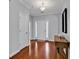 Inviting entryway featuring hardwood floors, white trim, and neutral wall colors at 4814 Greenhaven Dr., North Myrtle Beach, SC 29582