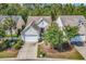 Charming single-story home with a two-car garage, complemented by a well-manicured front yard and picket fence at 4814 Greenhaven Dr., North Myrtle Beach, SC 29582
