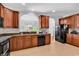 Kitchen boasts granite counters, wood cabinets, and modern appliances at 4814 Greenhaven Dr., North Myrtle Beach, SC 29582