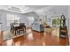 Spacious living room showcasing vaulted ceilings, hardwood floors, and ample natural light at 4814 Greenhaven Dr., North Myrtle Beach, SC 29582