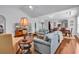 Spacious living room featuring hardwood floors, vaulted ceiling, and comfortable seating at 4814 Greenhaven Dr., North Myrtle Beach, SC 29582