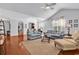 Bright living room features hardwood floors, high ceilings, and comfortable seating at 4814 Greenhaven Dr., North Myrtle Beach, SC 29582