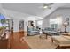 Spacious living room with high ceilings, fan and hardwood floors, perfect for relaxation at 4814 Greenhaven Dr., North Myrtle Beach, SC 29582