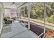 Screened-in patio with a ceiling fan and outdoor seating at 4814 Greenhaven Dr., North Myrtle Beach, SC 29582