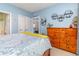 Well lit bedroom featuring a wooden dresser, carpet and doorway views at 4847 Carnation Circle # 201, Myrtle Beach, SC 29577