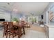 Open-concept living and dining area with ample seating and plenty of natural light at 4847 Carnation Circle # 201, Myrtle Beach, SC 29577