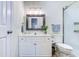 Clean bathroom with a white vanity, modern lighting, and a glass-enclosed shower for a sleek design at 503 20Th Ave. N # 15-A, North Myrtle Beach, SC 29582