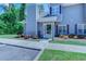 Charming two-story townhome with gray siding, colorful flower beds, and an inviting front entrance at 503 20Th Ave. N # 15-A, North Myrtle Beach, SC 29582