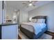 Serene main bedroom with a large bed, soft bedding, and access to an en-suite bathroom and closet at 503 20Th Ave. N # 15-A, North Myrtle Beach, SC 29582