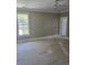 Bedroom with bright window and ceiling fan at 507 Hillside Dr. N, North Myrtle Beach, SC 29582