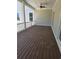 Outdoor deck featuring wood flooring, white railings, a ceiling fan, and recessed lights at 507 Hillside Dr. N, North Myrtle Beach, SC 29582