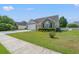 Well-maintained home with a manicured lawn, two-car garage and brick facade elements at 5107 Capulet Circle, Myrtle Beach, SC 29588