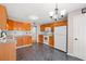 Charming kitchen featuring wood cabinets, granite countertops, and a white appliance package at 5107 Capulet Circle, Myrtle Beach, SC 29588