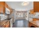 Spacious kitchen featuring wood cabinets, granite countertops, and stainless steel appliances at 5107 Capulet Circle, Myrtle Beach, SC 29588