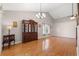 Well-lit living area features wood flooring and a high ceiling, creating a spacious feel at 5107 Capulet Circle, Myrtle Beach, SC 29588