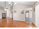 Open living room with wood floors, seamlessly connecting to the kitchen for easy living at 5107 Capulet Circle, Myrtle Beach, SC 29588