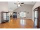 Spacious living room featuring vaulted ceilings, wood floors, and abundant natural light at 5107 Capulet Circle, Myrtle Beach, SC 29588