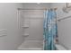 Bathroom featuring a tub and shower curtain with nautical theme at 5309 Abbey Park Loop, Myrtle Beach, SC 29579