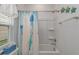 Bathroom featuring a tub and shower curtain with nautical theme at 5309 Abbey Park Loop, Myrtle Beach, SC 29579