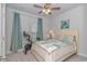 Cozy bedroom with a comfortable bed, a bicycle, and matching coastal decor at 5309 Abbey Park Loop, Myrtle Beach, SC 29579
