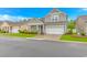 Charming two-story home with a well-manicured lawn and a two-car garage at 5309 Abbey Park Loop, Myrtle Beach, SC 29579