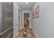 Inviting hallway with hardwood floors leading to the main living areas at 5309 Abbey Park Loop, Myrtle Beach, SC 29579