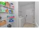 Practical laundry area with shelving and washer/dryer at 5309 Abbey Park Loop, Myrtle Beach, SC 29579