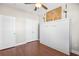 Bedroom featuring a murphy bed with hardwood floors and overhead lighting at 5485 Elba Way # 5485, Myrtle Beach, SC 29579