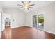 Bedroom featuring vaulted ceiling, sliding glass doors to the outside deck, and wood flooring at 5485 Elba Way # 5485, Myrtle Beach, SC 29579