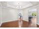 Well-lit dining room with hardwood floors and crown molding details at 5485 Elba Way # 5485, Myrtle Beach, SC 29579