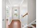 Entryway featuring hardwood floors and a view of the lake through the front door at 5485 Elba Way # 5485, Myrtle Beach, SC 29579