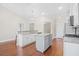 Open concept kitchen featuring a kitchen island, sleek cabinets, and stainless steel appliances at 5485 Elba Way # 5485, Myrtle Beach, SC 29579
