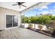 Screened patio overlooking a lush backyard and blue skies at 5485 Elba Way # 5485, Myrtle Beach, SC 29579